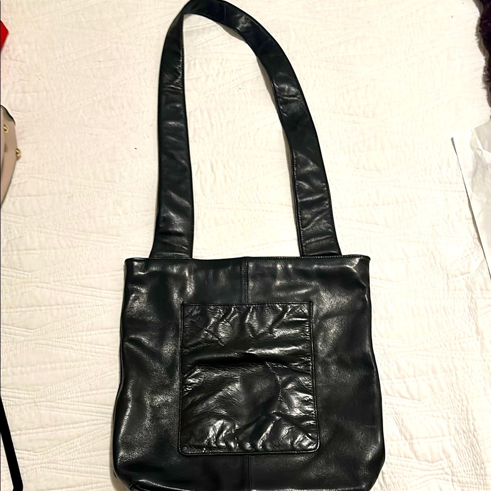 Preswick & Moore black tote.No wear on handles.Great fun everyday long tote bag